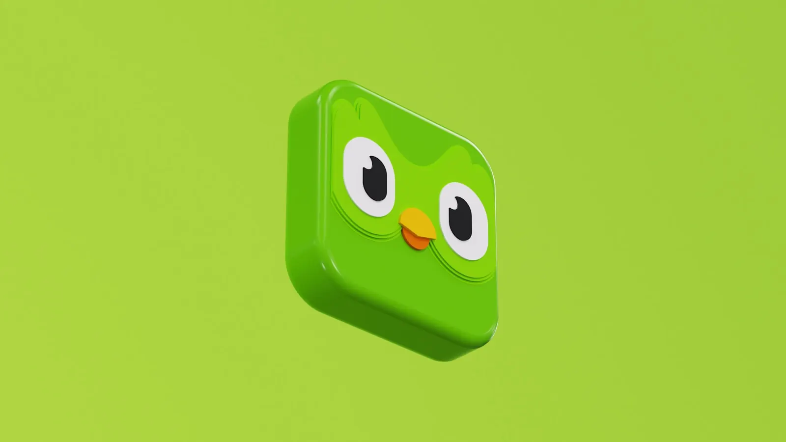 Illustratie van een glanzend groen blok met de kenmerken van een cartoon vogel op een effen groene achtergrond.